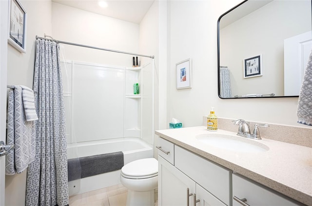 full bathroom featuring vanity, tile patterned floors, toilet, and shower / bath combo