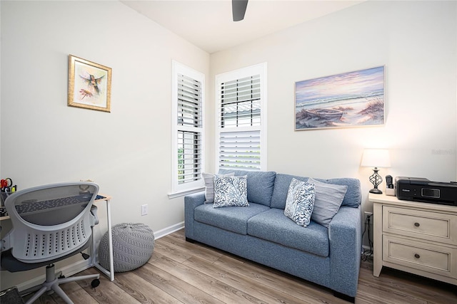 office featuring ceiling fan and light hardwood / wood-style floors