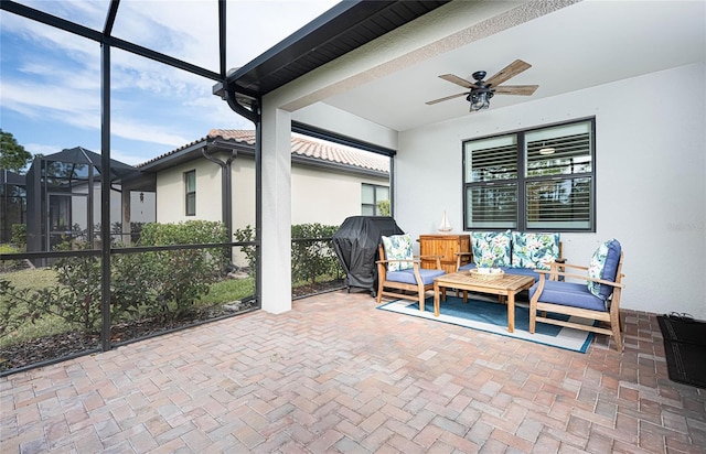 view of patio / terrace with an outdoor living space, grilling area, and ceiling fan