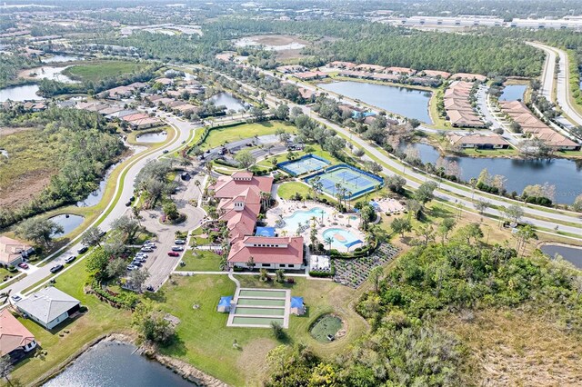 birds eye view of property featuring a water view