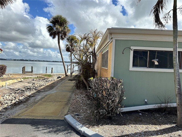 view of side of property with a water view