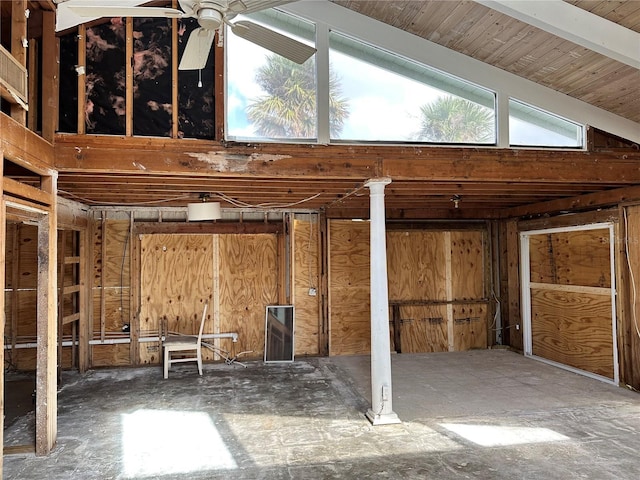 misc room with vaulted ceiling with beams and ceiling fan