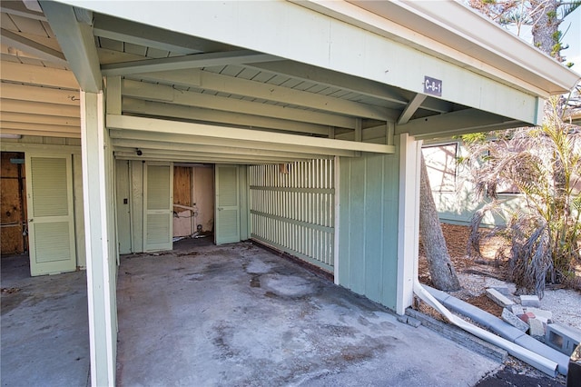 garage featuring a carport