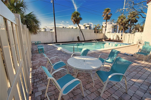 view of pool with a patio area