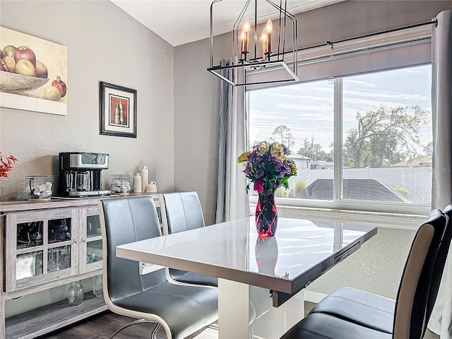 dining room with a notable chandelier