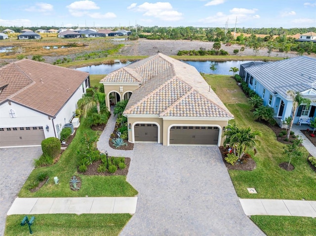 drone / aerial view featuring a water view