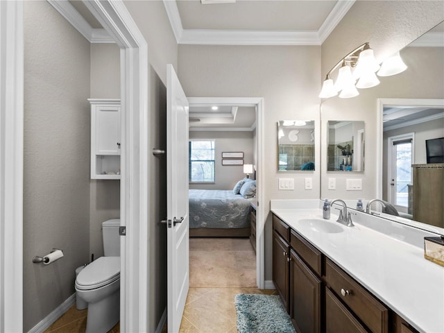 bathroom with tile patterned floors, toilet, vanity, and crown molding