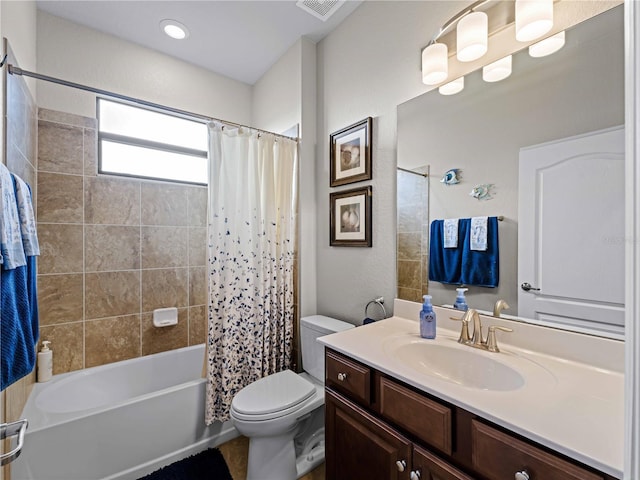 full bathroom with toilet, vanity, and shower / bath combo