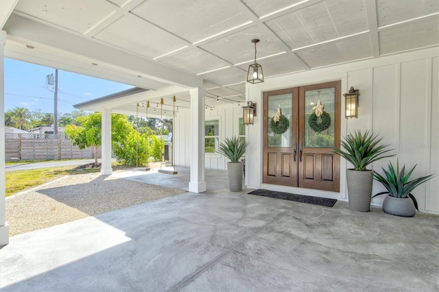 doorway to property featuring french doors