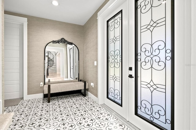 entryway featuring french doors