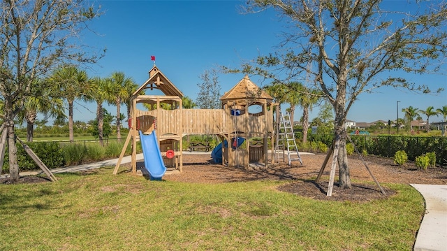 view of play area featuring a lawn