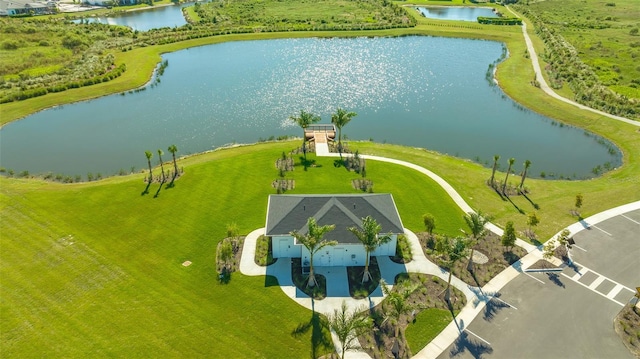 bird's eye view with a water view