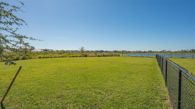 view of yard with a water view