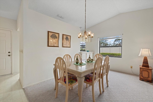 dining space with vaulted ceiling, a notable chandelier, and a textured ceiling