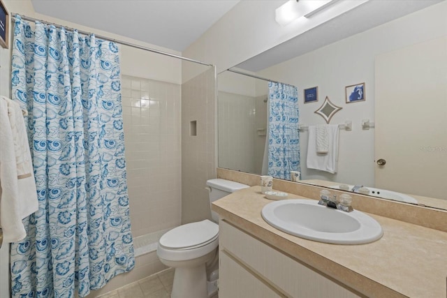 bathroom with toilet, tile patterned flooring, a shower with curtain, and vanity