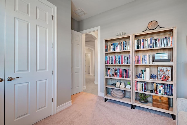 living area with carpet flooring