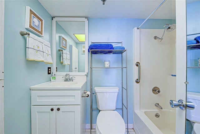 full bathroom featuring toilet, tile patterned floors, vanity, and bathtub / shower combination