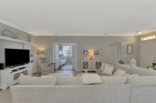 tiled living room with crown molding