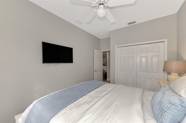 bedroom featuring ceiling fan and a closet