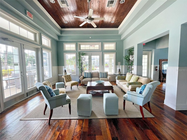 living room featuring ceiling fan, wood-type flooring, french doors, and wooden ceiling