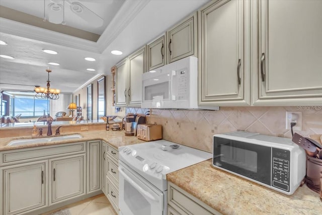 kitchen featuring sink, crown molding, an inviting chandelier, white appliances, and backsplash