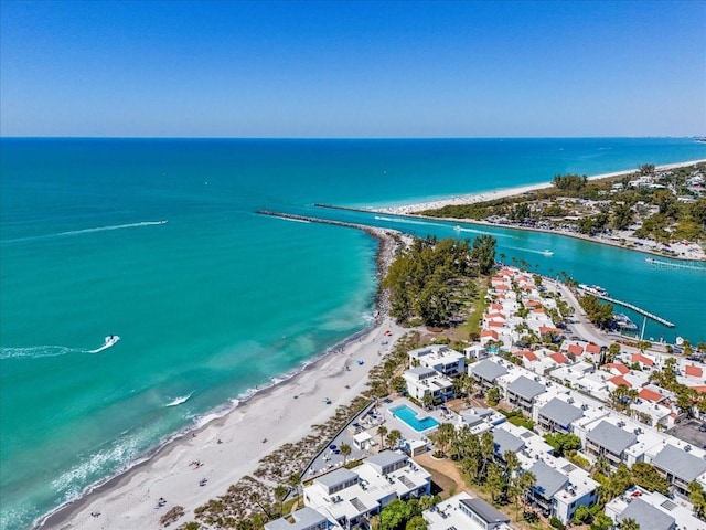 aerial view with a water view and a view of the beach