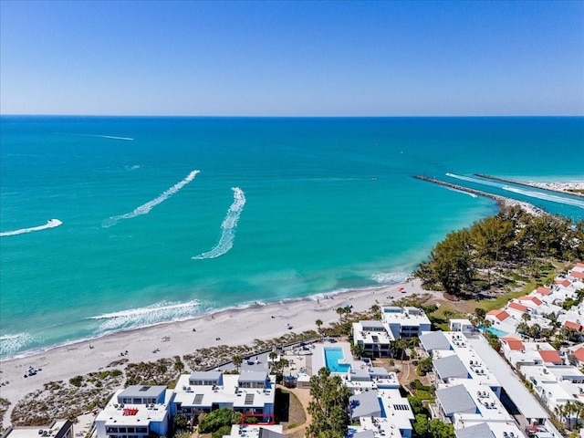 aerial view featuring a water view and a beach view