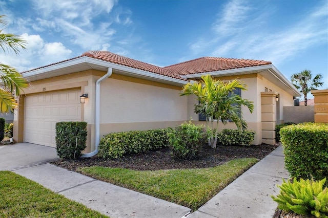 view of property exterior with a garage