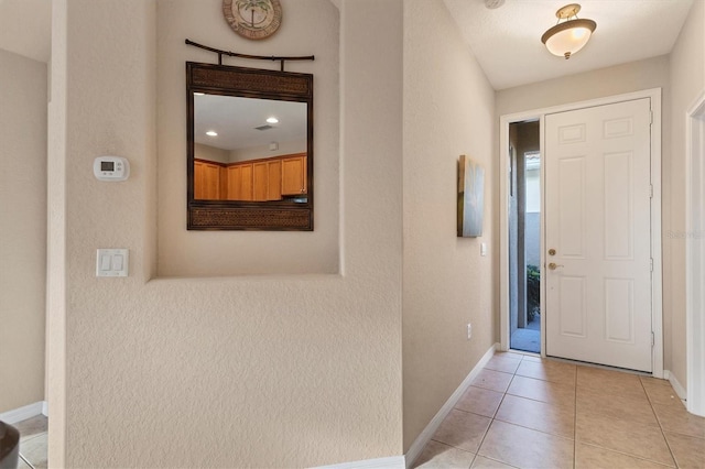 view of tiled entrance foyer