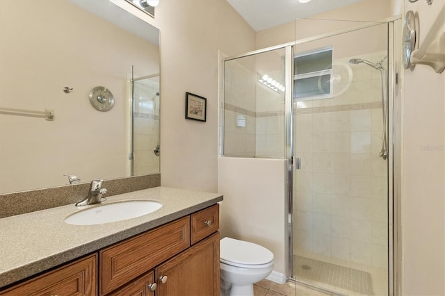 bathroom with vanity, toilet, and walk in shower