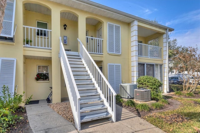 view of property featuring central AC unit