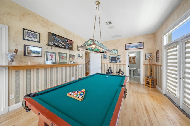 recreation room featuring light wood-type flooring, sink, and pool table