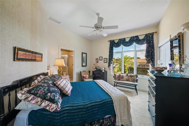 bedroom featuring light carpet and ceiling fan