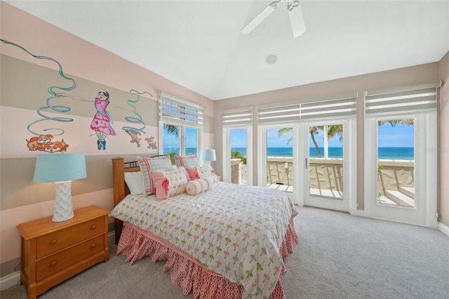 carpeted bedroom with a water view, a beach view, ceiling fan, and access to outside