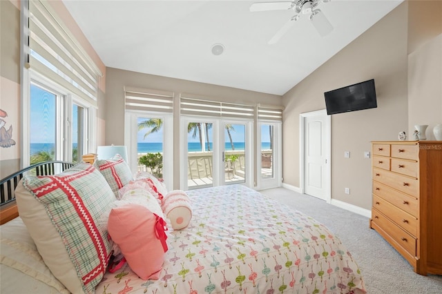 carpeted bedroom with ceiling fan, access to outside, and vaulted ceiling