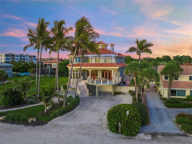 mediterranean / spanish-style house featuring a balcony