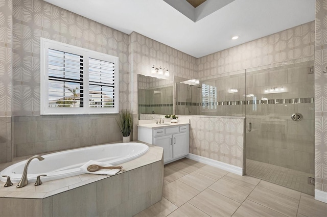 full bathroom with wallpapered walls, a stall shower, vanity, tile patterned flooring, and a bath