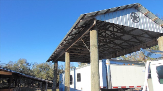 exterior space featuring a carport