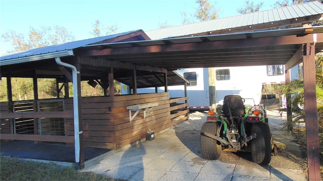 view of patio featuring an outdoor structure