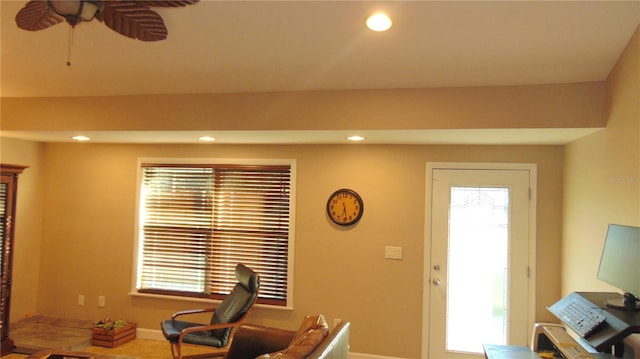 living room featuring ceiling fan