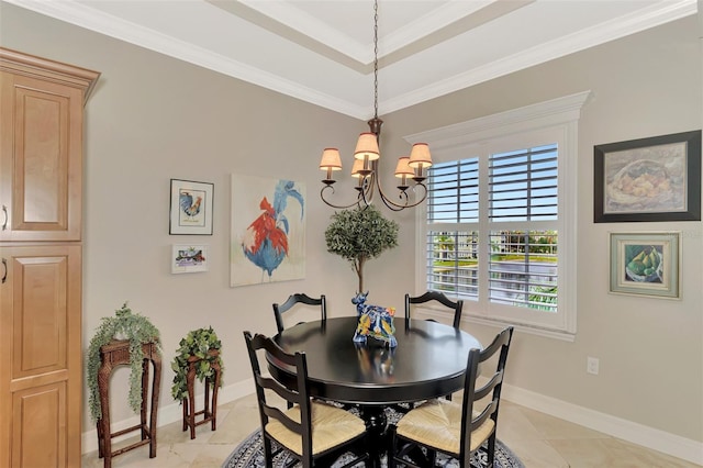 tiled dining room featuring a tray ceiling, crown molding, and a chandelier