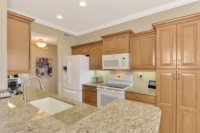 kitchen featuring crown molding, sink, light stone counters, and white appliances