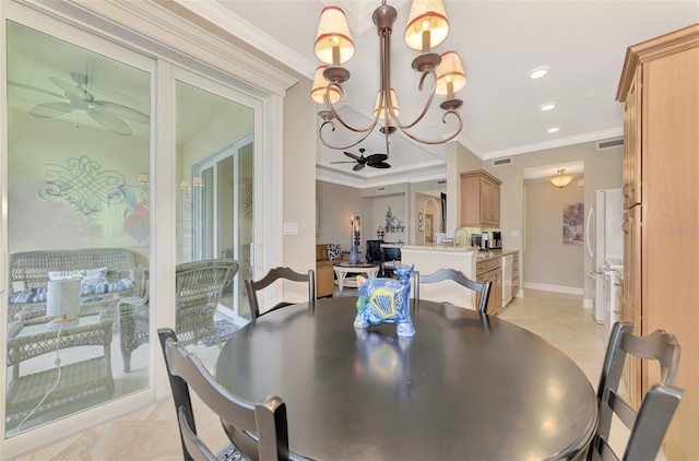 dining space featuring ceiling fan with notable chandelier and crown molding