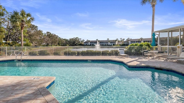 view of pool featuring a patio area