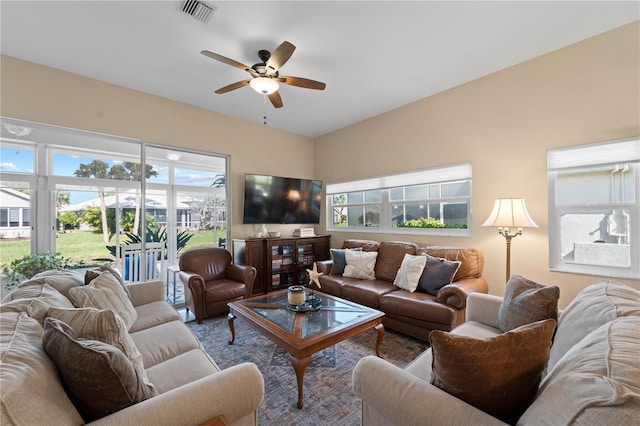 living room featuring ceiling fan