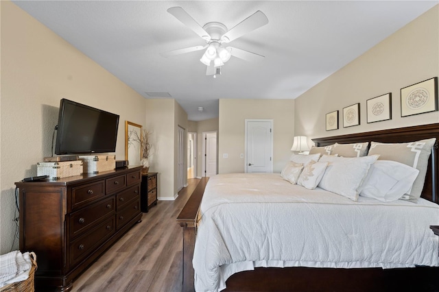 bedroom featuring ceiling fan and wood-type flooring