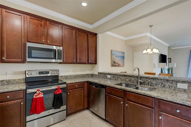 kitchen with light stone counters, sink, ornamental molding, and stainless steel appliances