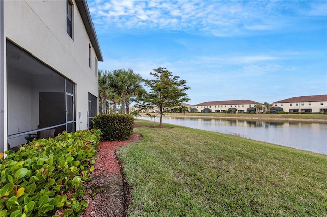 view of yard with a water view