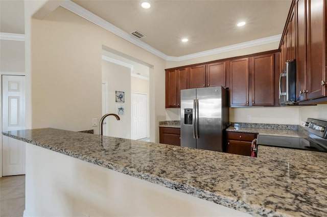 kitchen featuring light stone countertops, kitchen peninsula, appliances with stainless steel finishes, and ornamental molding