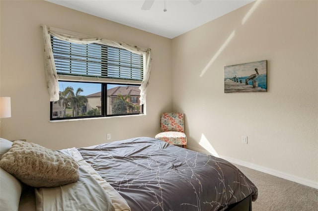 bedroom featuring ceiling fan and carpet flooring